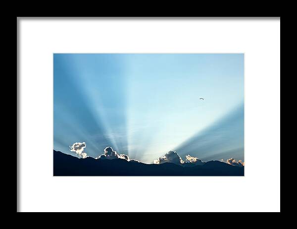 Empty Framed Print featuring the photograph Sunbeams Behind Clouds by Ieverest