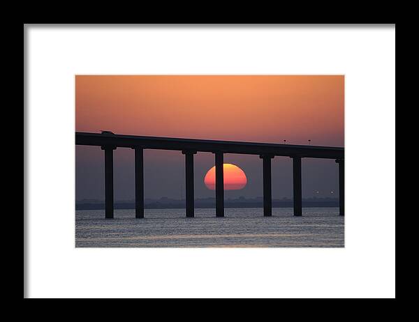 Sunshine Skyway Bridge Framed Print featuring the photograph Sunrise and bridge by Bradford Martin