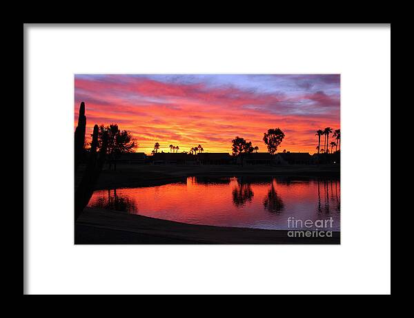 Sunsets/sunrises Framed Print featuring the photograph Sunrise at Polly's by Bob Hislop