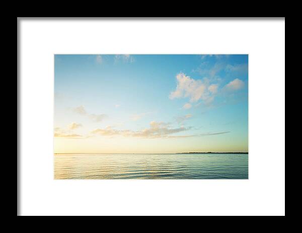 Scenics Framed Print featuring the photograph Sunrise Over Sea by Spooh