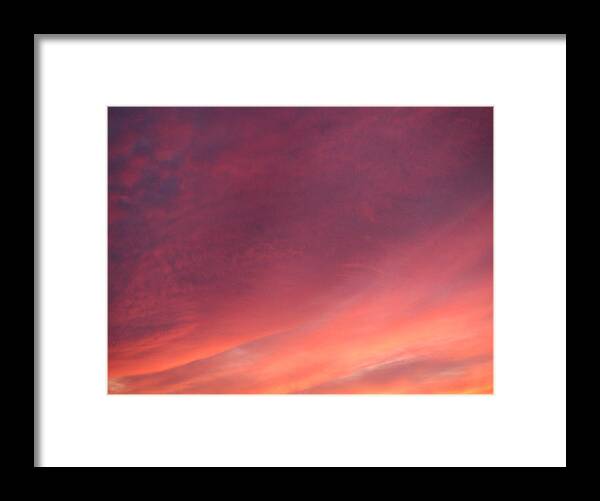 Sky Clouds Sunset Framed Print featuring the photograph Sunset Hues by Laurie Stewart