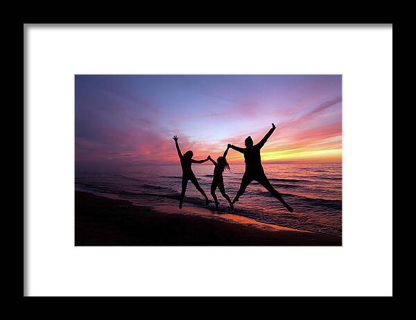 People Framed Print featuring the photograph Sunset Jumping by Ballycroy