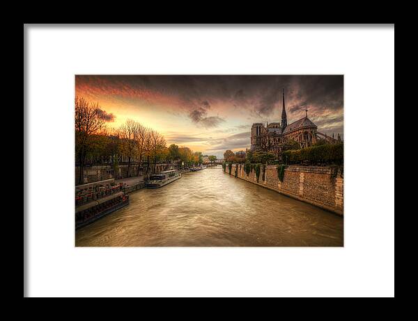 Notre Dame Cathedral Framed Print featuring the photograph Sunset on Notre Dame by Ryan Wyckoff