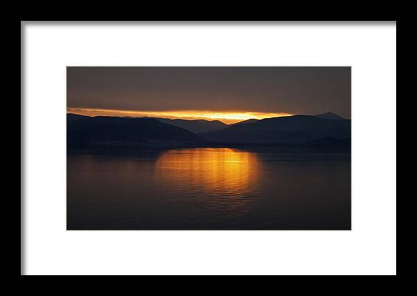 Romantic Framed Print featuring the photograph Sunset over mountains and sea by Mike Santis