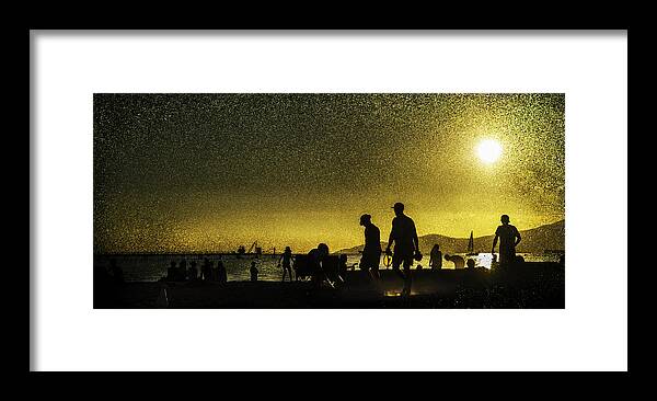 Back Lit Framed Print featuring the photograph Sunset silhouette of people at the beach by Peter V Quenter