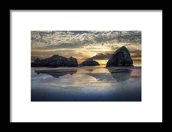 Clouds Framed Print featuring the photograph Sunset Stacks by Debra and Dave Vanderlaan