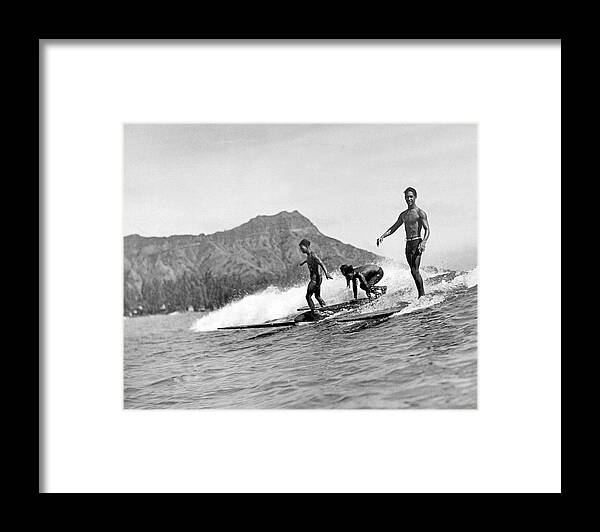 16-20 Years Framed Print featuring the photograph Surfing In Honolulu by Underwood Archives