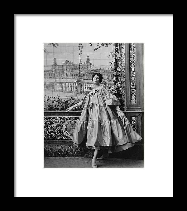 Fashion Framed Print featuring the photograph Suzy Parker Wearing A Coat By Pertegaz by Henry Clarke