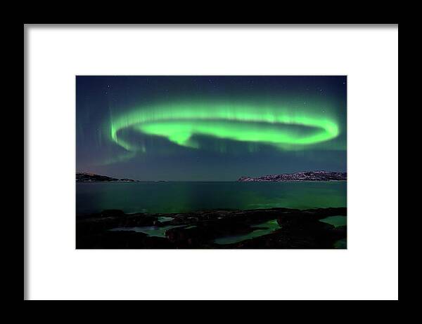 Tranquility Framed Print featuring the photograph Swirling Aurora by John Hemmingsen