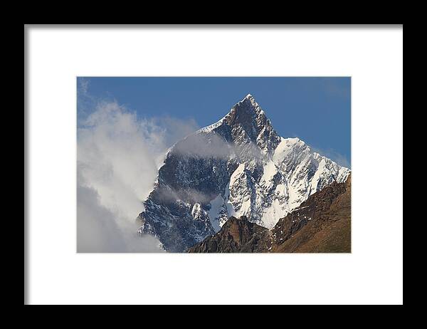 Matterhorn Framed Print featuring the photograph Swiss Alps shrouded in clouds by Jetson Nguyen