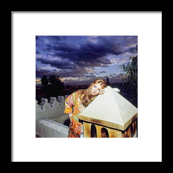Marrakesh Framed Print featuring the photograph Talitha Getty Leaning On Lantern At Sunset by Patrick Lichfield