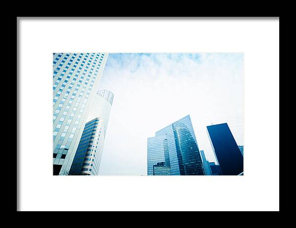 Corporate Business Framed Print featuring the photograph Tall Skyscraper From Low Angle View by Franckreporter
