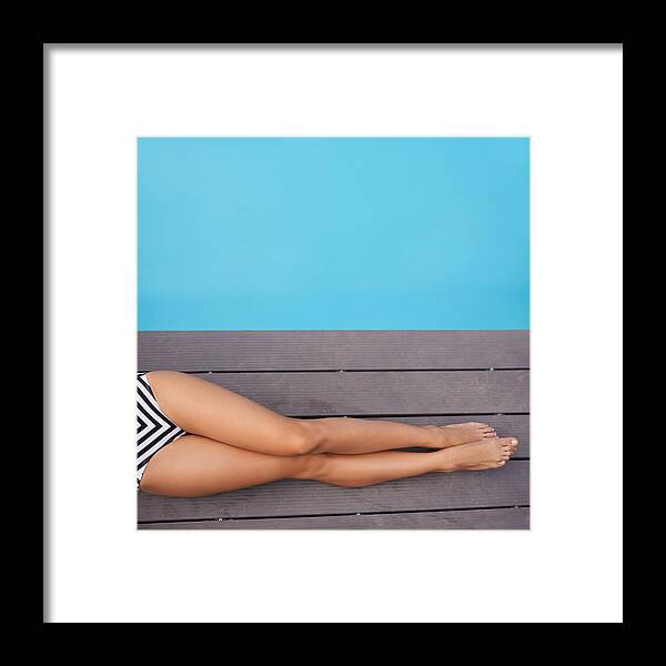 Recreational Pursuit Framed Print featuring the photograph Tanned, toned and stylish by PeopleImages