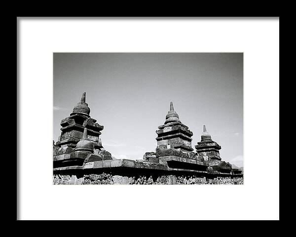 Borobudur Framed Print featuring the photograph The Ancient Stupas Of Borobudur by Shaun Higson