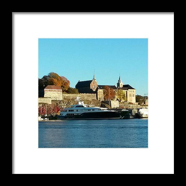 Akershus Festning Is A Norwegian Castle And It Was Finished In Year 1300 And Moreover It Is A National Symbol In Oslo City Framed Print featuring the photograph The Castle By the Waterfront by Jeanette Rode Dybdahl