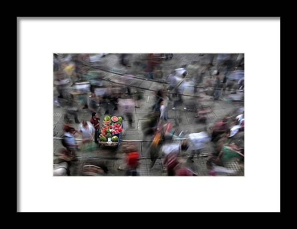 Salesman Framed Print featuring the photograph The Chaos Of The City by Fatih Balkan