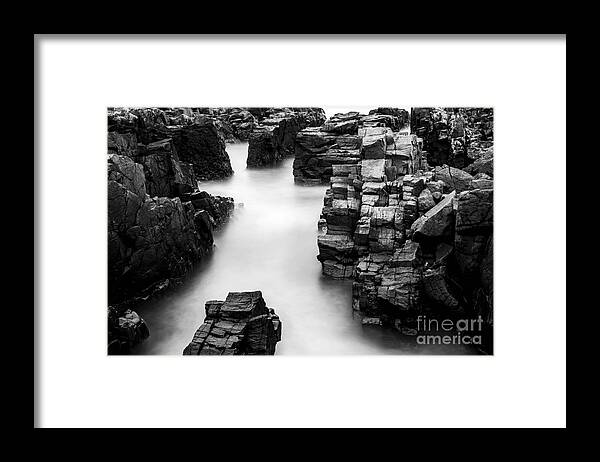 Black And White Framed Print featuring the photograph The cliffs by Gunnar Orn Arnason