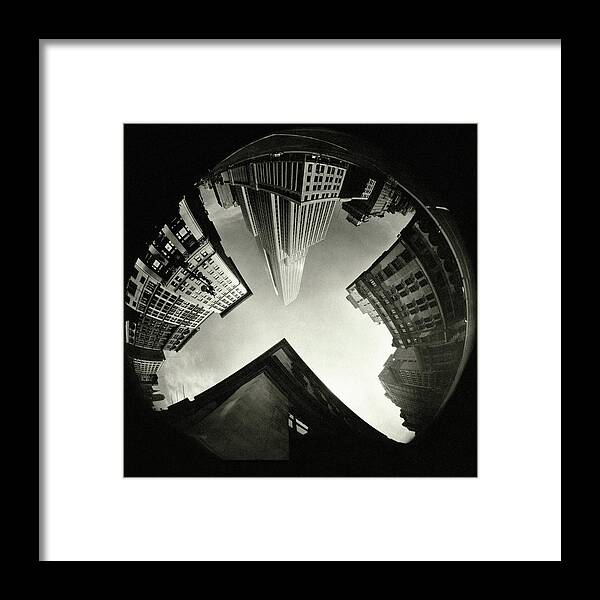 Architecture Framed Print featuring the photograph The Empire State Building In New York City by Ralph Steiner