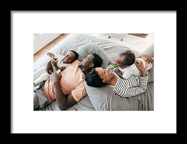Toddler Framed Print featuring the photograph The family home-buying handbook by Kate_sept2004