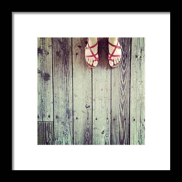 Feet Framed Print featuring the photograph The Girl With Two Red Shoes by Jill Tuinier