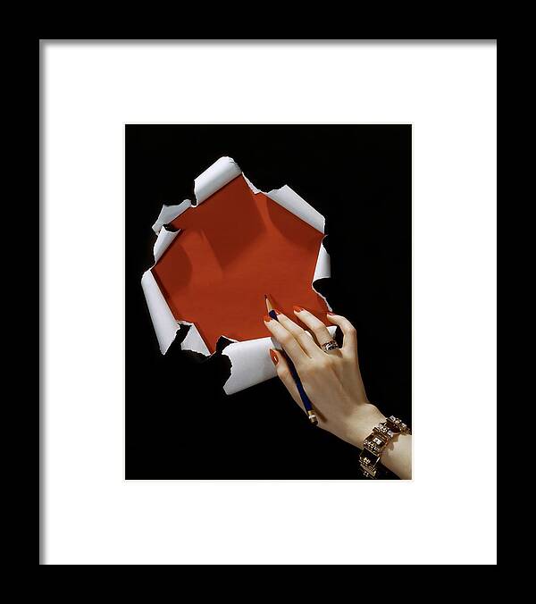 Jewelry Framed Print featuring the photograph The Hand Of A Woman Reaching Towards Torn by Horst P. Horst