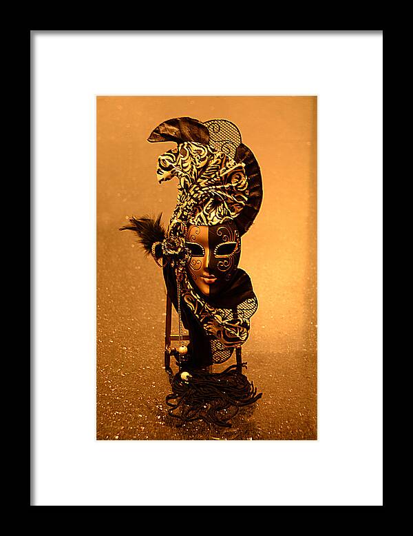 Masquerade Mask Framed Print featuring the photograph She is Waiting..... by Renee Anderson