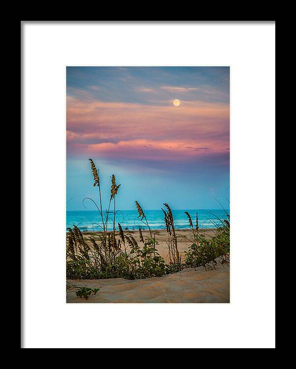 Moon Framed Print featuring the photograph The moon and the sunset at South Padre Island by Micah Goff