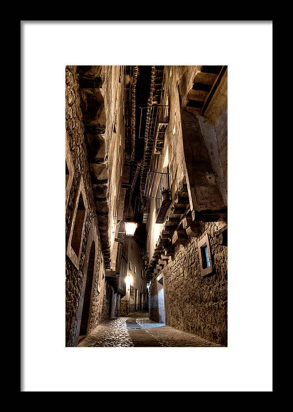 Narrow Street Framed Print featuring the photograph Narrow street in Albarracin by Weston Westmoreland