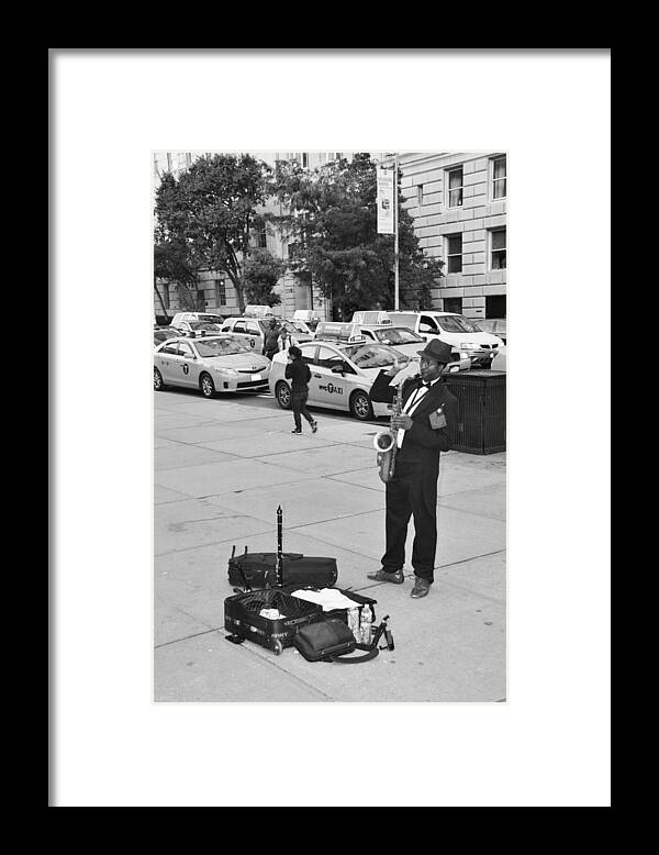 Scenic Framed Print featuring the photograph THE SAXMAN in BLACK AND WHITE by Rob Hans