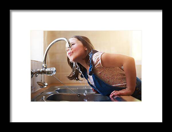 Child Framed Print featuring the photograph The thirst is real by PeopleImages