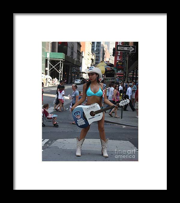 The Times Square Naked Cowgirl Framed Print featuring the photograph The Times Square Naked Cowgirl by John Telfer