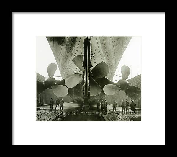 Engineering; Building; Shipyard; Disaster; Sea; Tragedy; Tragic; Transatlantic; Liner; Drydock; Dry Dock; Propeller Framed Print featuring the photograph The Titanics propellers in the Thompson Graving Dock of Harland and Wolff by English Photographer