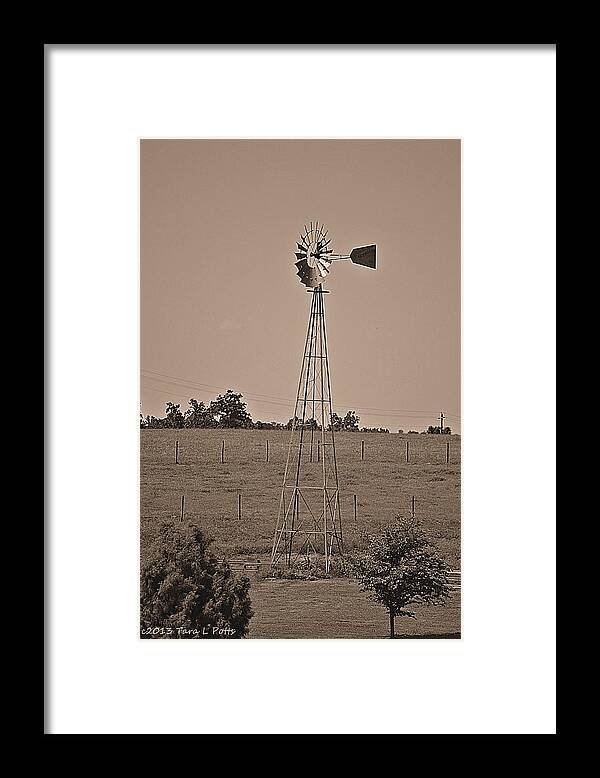 Windmill Framed Print featuring the photograph The Windmill by Tara Potts