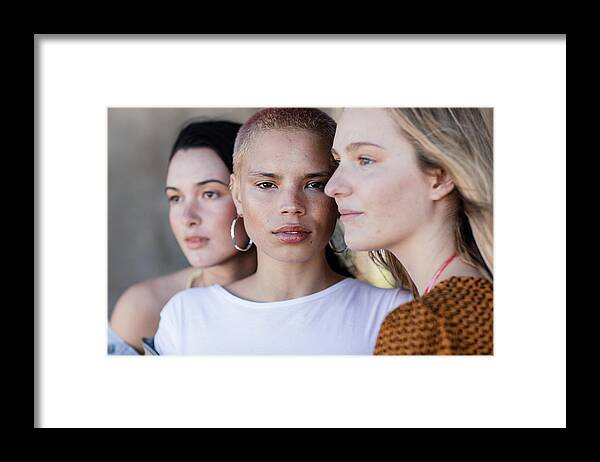 Cool Attitude Framed Print featuring the photograph Three beautiful young women looking various directions by Smith Collection