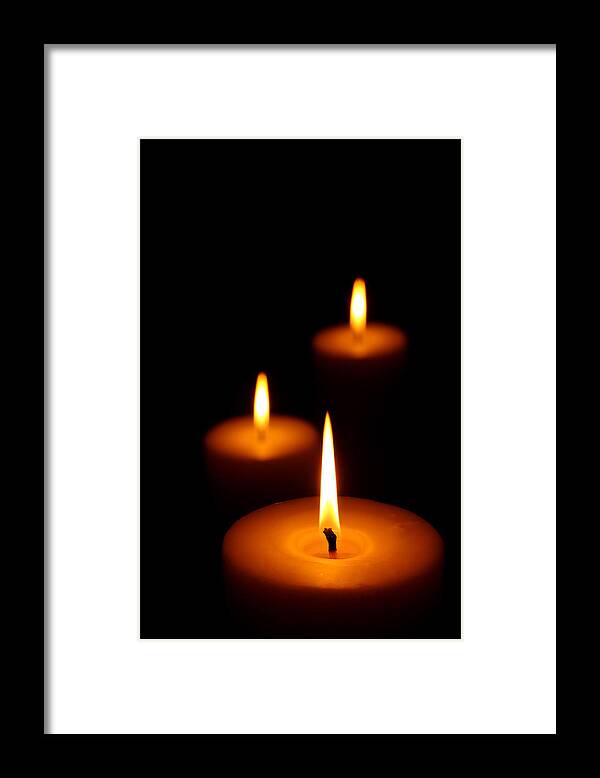 Candle Framed Print featuring the photograph Three Burning candles by Johan Swanepoel