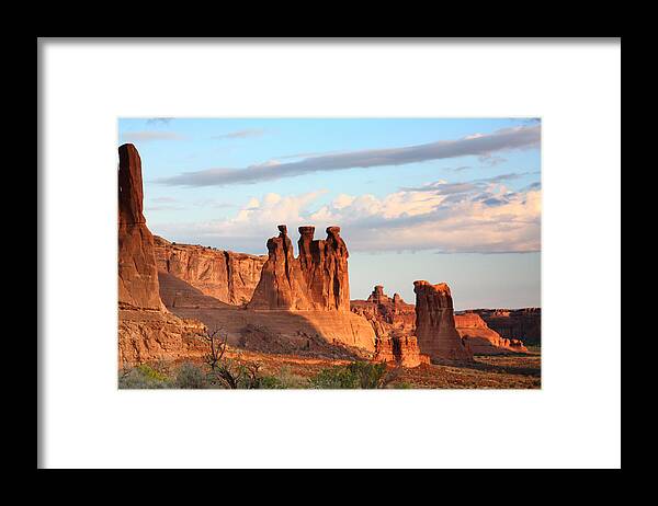 Arches Np Framed Print featuring the photograph Three Gossips in Arches National Park by Jean Clark