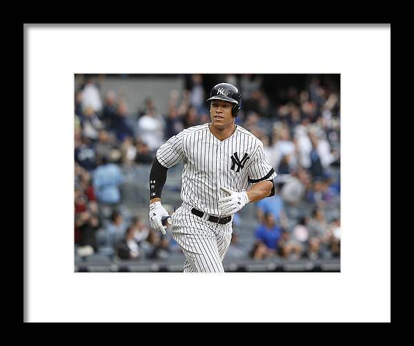 People Framed Print featuring the photograph Toronto Blue Jays vs New York Yankees by Paul Bereswill