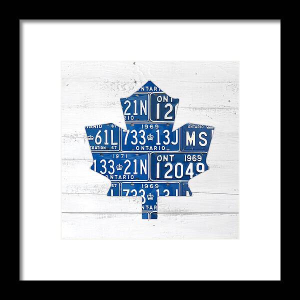 Toronto Framed Print featuring the mixed media Toronto Maple Leafs Hockey Team Retro Logo Vintage Recycled Ontario Canada License Plate Art by Design Turnpike