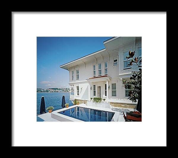 No People Framed Print featuring the photograph Tourist Resort By Water by Erhard Pfeiffer