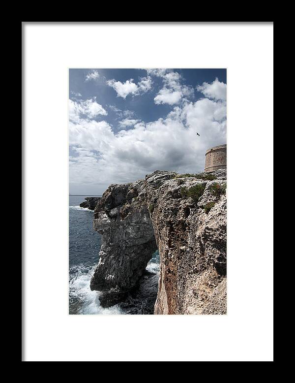 Architecture Framed Print featuring the photograph Stunning tower over the cliffs of Alcafar in MInorca island - Tower and sea by Pedro Cardona Llambias