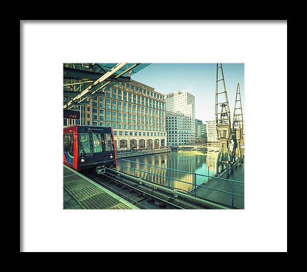 Downtown District Framed Print featuring the photograph Train In Subway Station At Canary by Cirano83