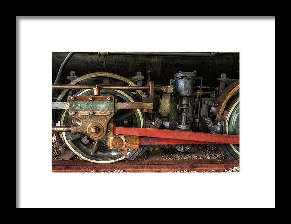 Train Wheels Framed Print featuring the photograph Train Wheels by Mark Papke