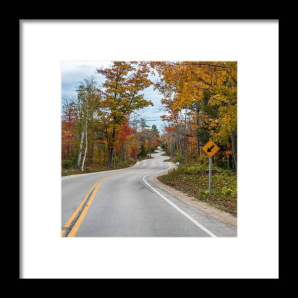 Green Framed Print featuring the photograph Twisted Road by Paul Freidlund
