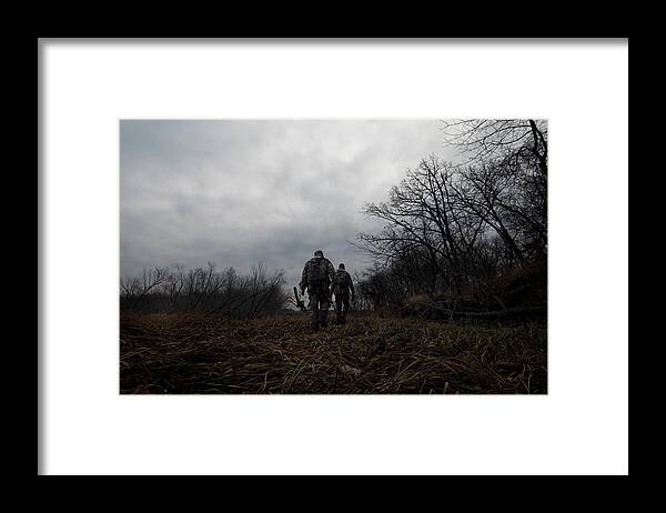 Arrows Framed Print featuring the photograph Two Bow Hunters Walking Home At The End by Joel Sheagren