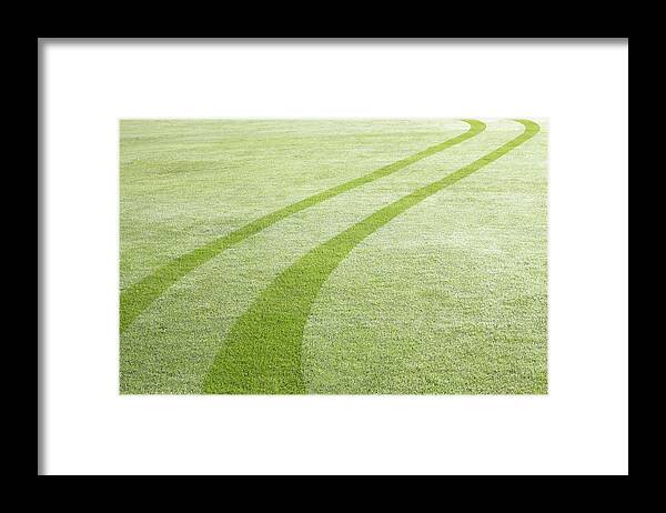 Curve Framed Print featuring the photograph Tyre Tracks In Dew by Ezra Bailey