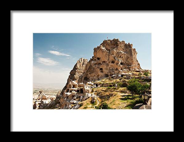 Tufa Framed Print featuring the photograph Uchisar Castle In Capadocia by Guvendemir