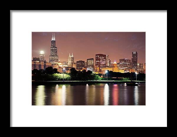 Lake Michigan Framed Print featuring the photograph Usa, Illinois, Chicago Skyline At Dusk by Henryk Sadura
