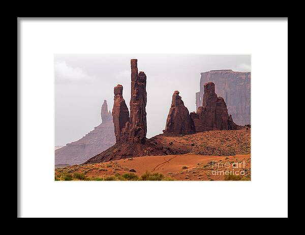Red Rocks Framed Print featuring the photograph Vanguards by Jim Garrison
