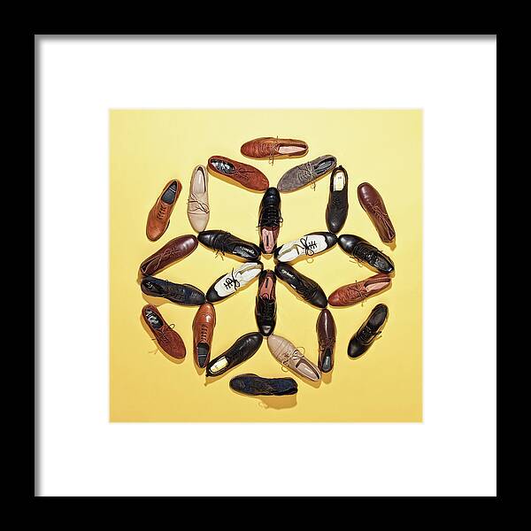 Menswear Framed Print featuring the photograph Various Lace Up Shoes Arranged In A by Fstop Images - Larry Washburn