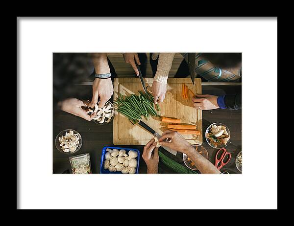 Mid Adult Women Framed Print featuring the photograph Vegetables being cut in cooking class by Hinterhaus Productions